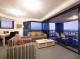 2 Bedroom Apartment Living room
 - Oaks Brisbane Aurora Suites