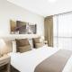 Bedroom
 - Oaks Brisbane on Charlotte Suites