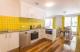 San Francisco inspired kitchen and dining area
 - One of a Kind Apartments