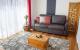 One-Bedroom Apartment Living Room
 - One of a Kind Apartments