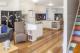 Two-Bedroom Terrace Kitchen and Living Area
 - One of a Kind Apartments