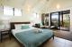 Beachfront Bure-Bedroom/Living Area
 - Palm Bay Resort