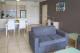 One Bedroom Apartment Lounge
 - Park Regis Cairns City Quays