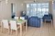 One Bedroom Apartment Dining Area
 - Park Regis Cairns City Quays