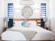 Peninsula Suite Bedroom
 - Peninsula Boutique Hotel
