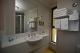 Apt Bathroom
 - The Woden Hotel