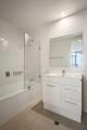Two Bedroom Apartment Bathroom
 - Quest on Franklin