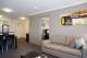 Spacious One Bedroom Apartment Living Area
 - Quest Sale