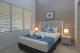 2 Bedroom Apartment Bedroom
 - Saltwater Luxury Apartments