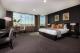 Bedroom
 - Springfield Lakes Hotel
