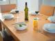 6-8 2BR Dining table with food
 - Sunnybank Star Hotel and Apartments