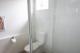 Self-Contained Apartment Bathroom
 - Tropic Coast Motel