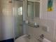 Bathroom
 - Tropical Palms Resort