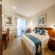 Deluxe Queen Room - Twin Towers Inn