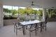 Poolside Penthouse patio by the pool
 - Vision Apartments Esplanade Cairns
