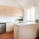 Kitchen
 - Voyages Emu Walk Apartments
