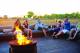 Relaxing around the fire
 - Wildman Wilderness Lodge